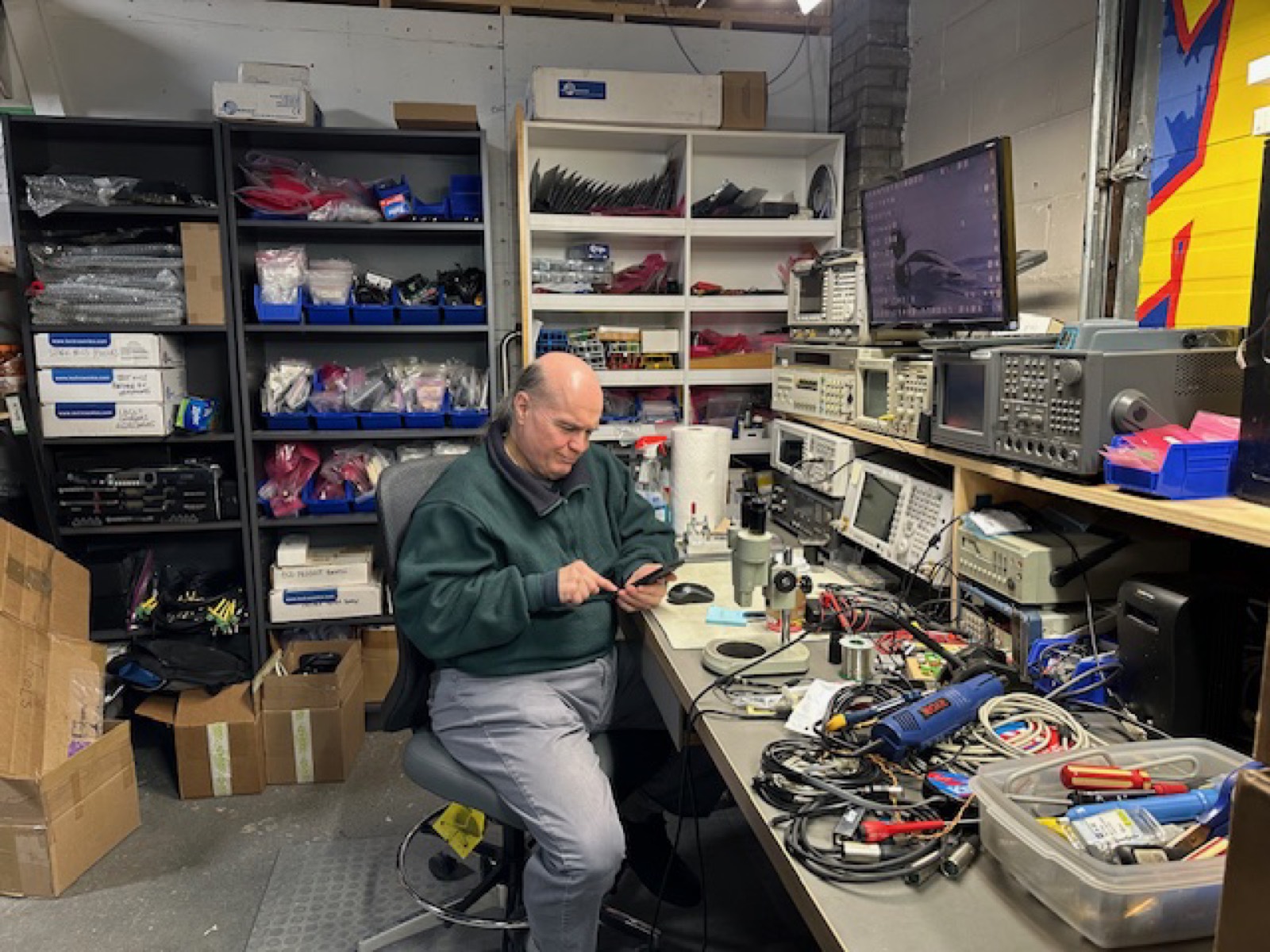 Senior RF technician at the service bench in Toronto