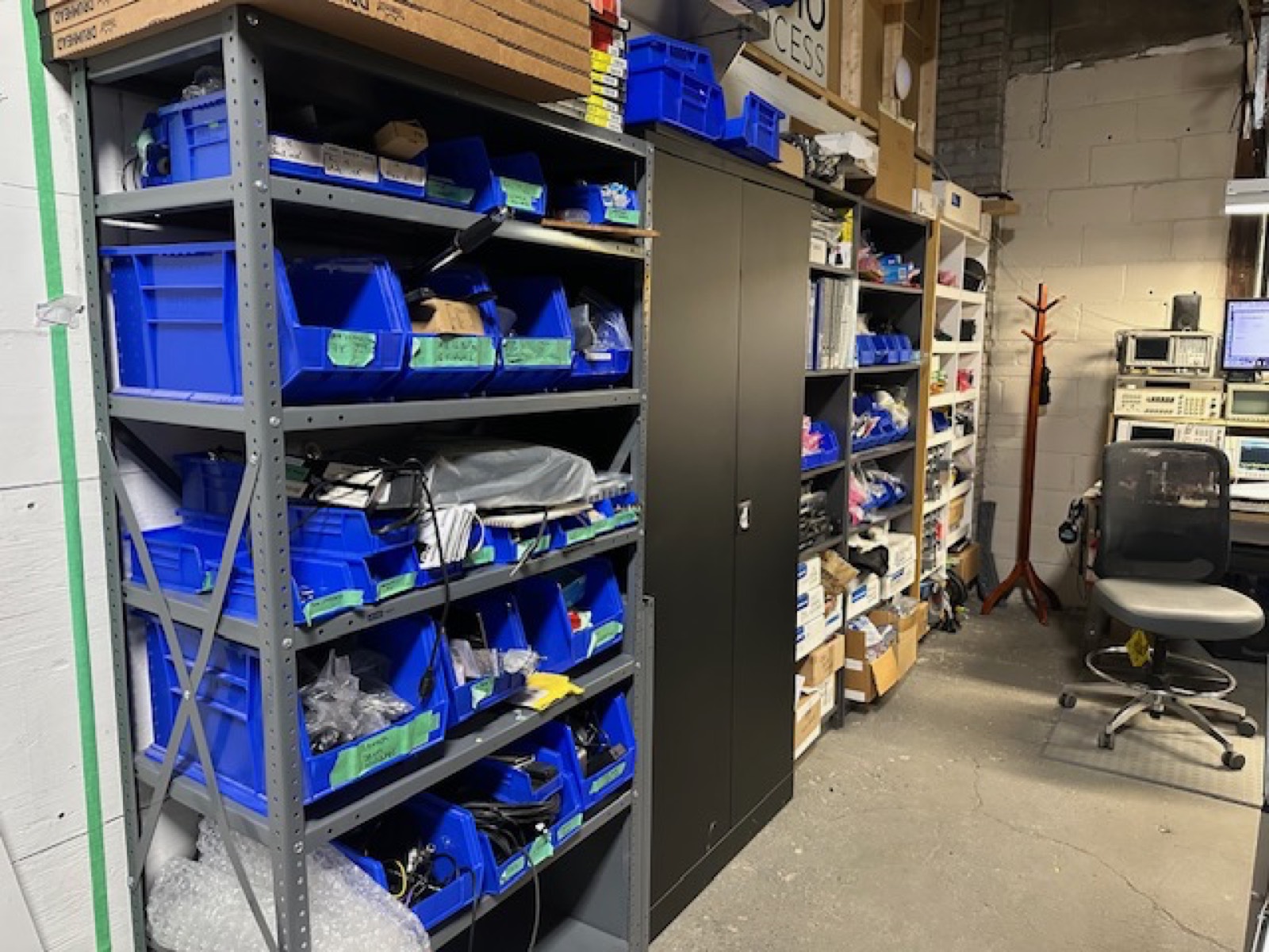 Stocked parts depot with labelled bins